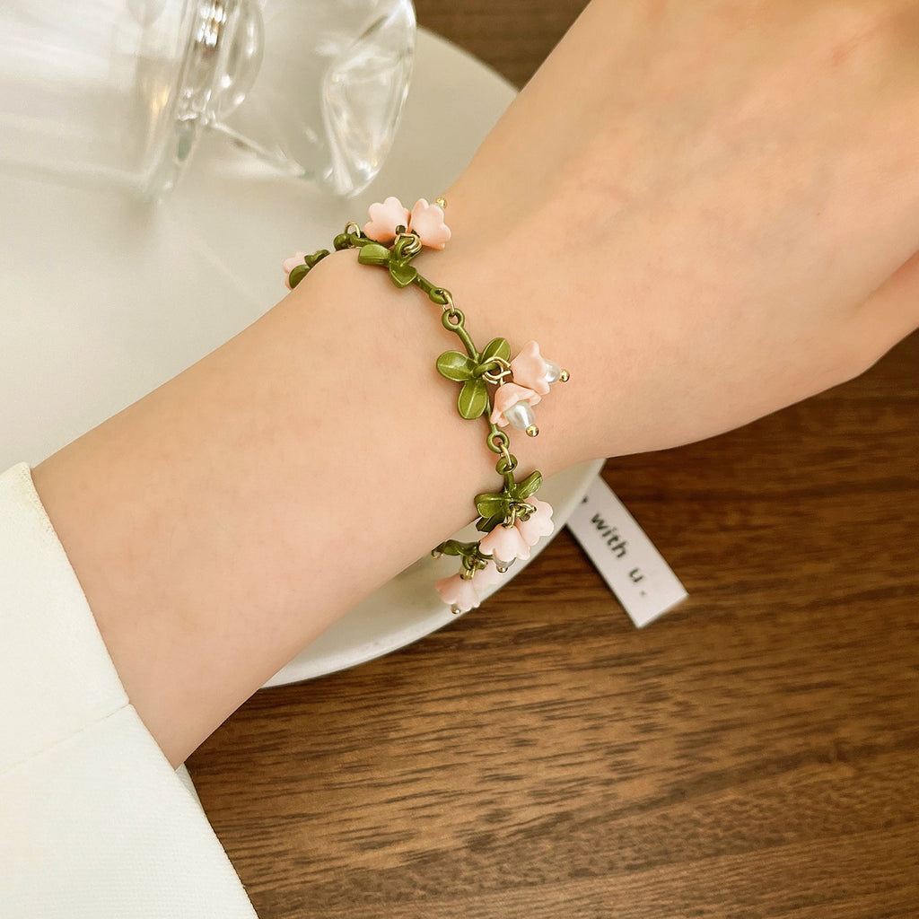 Collar y pulsera de hoja de flor de perla