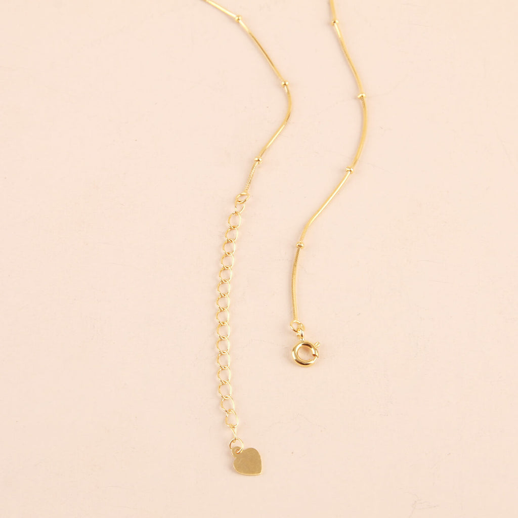 Collier chaîne de perles octogonales imbriquées
