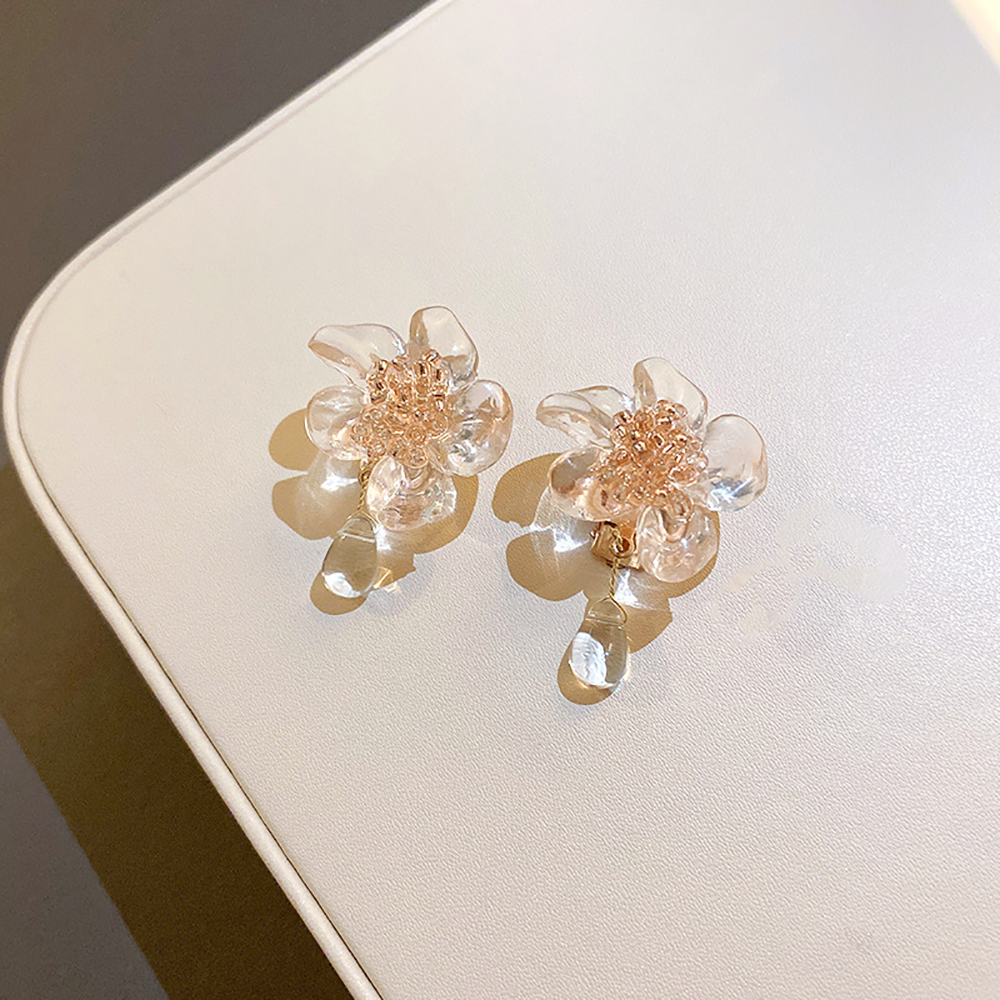 Clip d'oreille fleur acrylique