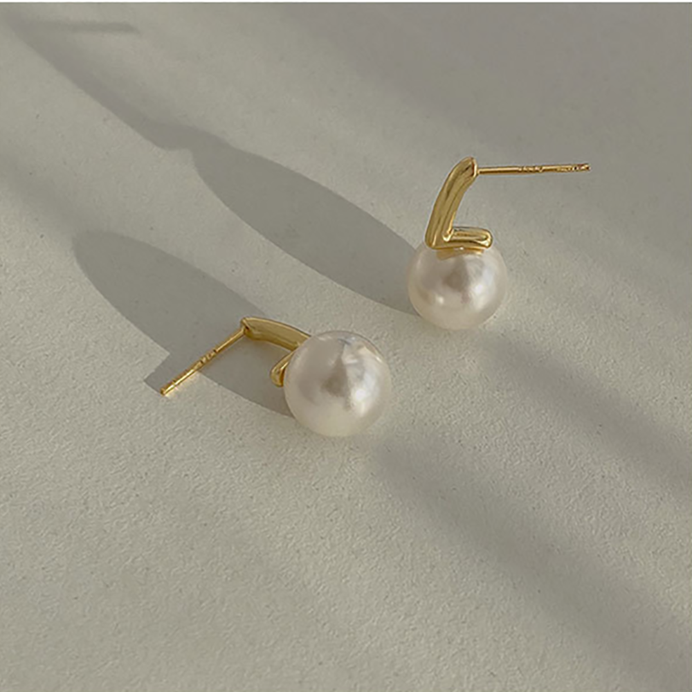 Boucles d'oreilles perle unique