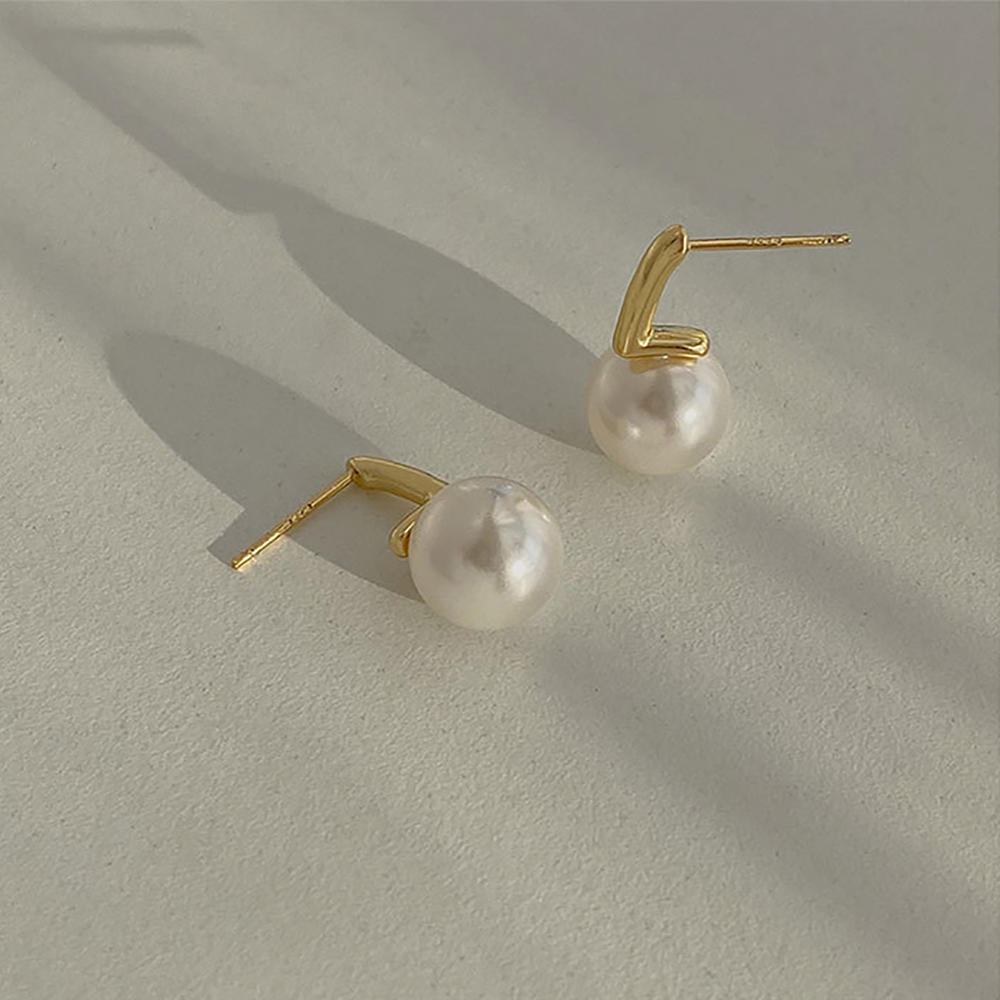 Boucles d'oreilles perle unique